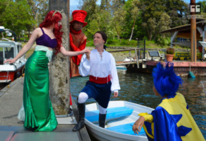 The costumed cast of BPA's "Little Mermaid" are seen here at the City dock in Waterfront Park (Photo Credit: BPA)