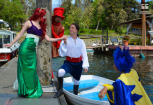 The costumed cast of BPA's "Little Mermaid" are seen here at the City dock in Waterfront Park (Photo Credit: BPA) 