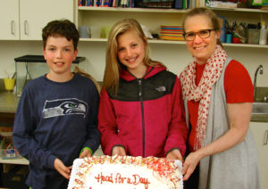 Head of School Trish King with Island School students